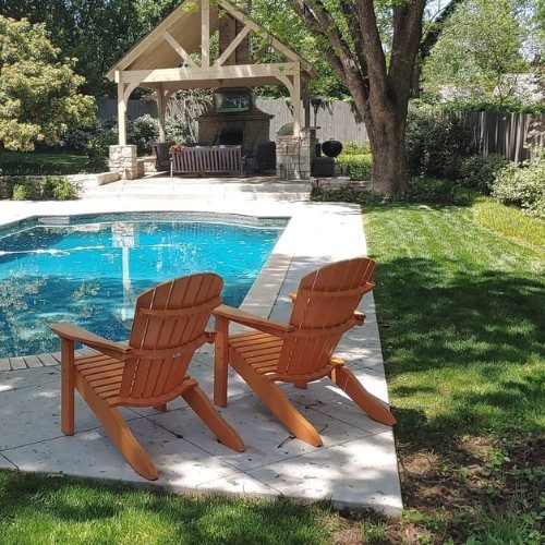 pool landscape design with chairs